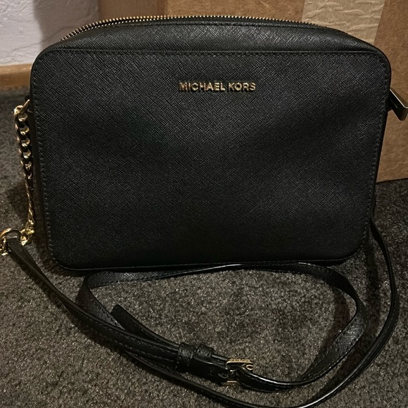 Jet Set crossbody, black with gold metal accents. - Picture 1 of 2